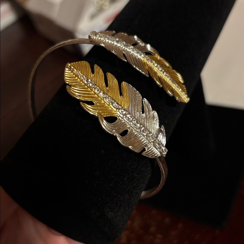 Gold and silver toned cuff feather bracelet - Picture 2 of 3